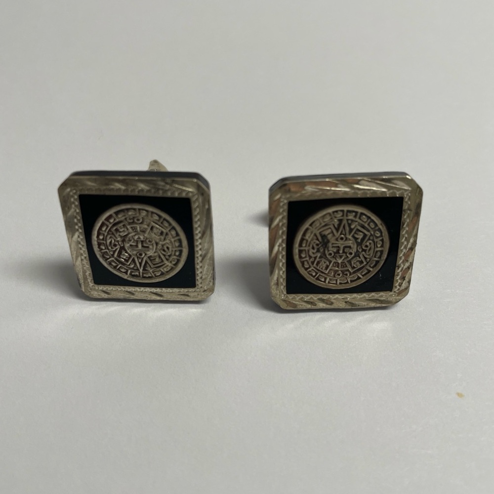 Ornate Sterling Silver and Black Cuff Links with Vintage Appeal